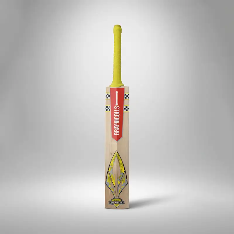 Gray Nicolls English Willow Bat Back Side Gray-Nicolls English Willow cricket bat shown upright from the back against a clean light gray studio background. The bat has a light natural wood blade with visible grain, a bright yellow textured handle grip, and a red vertical Gray-Nicolls branding panel near the upper back of the blade. Black-and-white checkered detailing appears on both sides of the upper blade, while a large yellow, gray, and black graphic runs down the lower back with a Venture badge near the bottom. A soft shadow and subtle reflection are visible beneath the bat. The image showcases the back side of a Gray-Nicolls English Willow cricket bat, available for purchase with delivery across Pakistan.