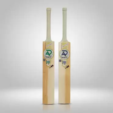 Two AR Sports UH99 English Willow cricket bats standing upright side by side against a clean light gray background. Both bats feature light-colored natural wood blades with visible grain, long handles covered with textured light-colored grips, and AR Sports branding with the UH99 model marking printed on the front of each blade. The bats have traditional flat faces and squared lower edges, with soft shadows and a subtle reflection beneath them from the studio lighting. The image showcases the AR Sports UH99 English Willow Cricket Bat, available for purchase with delivery across Pakistan.