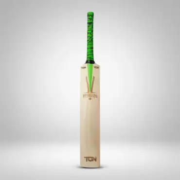 SS Ton Special Edition English Willow Cricket Bat with a light natural wood-colored blade, a bright green and black patterned rubber grip, and a black handle section. The bat has a straight, full-length blade with a clean surface, featuring the TON branding near the shoulders and lower blade, along with a Special Edition graphic and decorative green and brown detailing in the center. The bat is standing upright against a plain light gray background with a subtle shadow underneath. This image represents the SS Ton Special Edition English Willow Cricket Bat available for cricket players across Pakistan.