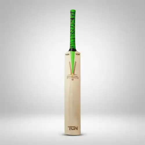 SS Ton Special Edition English Willow Cricket Bat with a light natural wood-colored blade, a bright green and black patterned rubber grip, and a black handle section. The bat has a straight, full-length blade with a clean surface, featuring the TON branding near the shoulders and lower blade, along with a Special Edition graphic and decorative green and brown detailing in the center. The bat is standing upright against a plain light gray background with a subtle shadow underneath. This image represents the SS Ton Special Edition English Willow Cricket Bat available for cricket players across Pakistan.